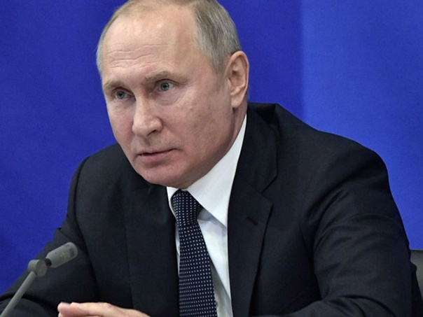 Путин: Повјерење у долар је у опадању, глобални трговински систем је у кризи
